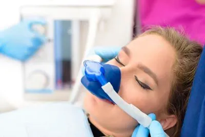 patient sleeping during their dental procedure thanks to sedation dentistry